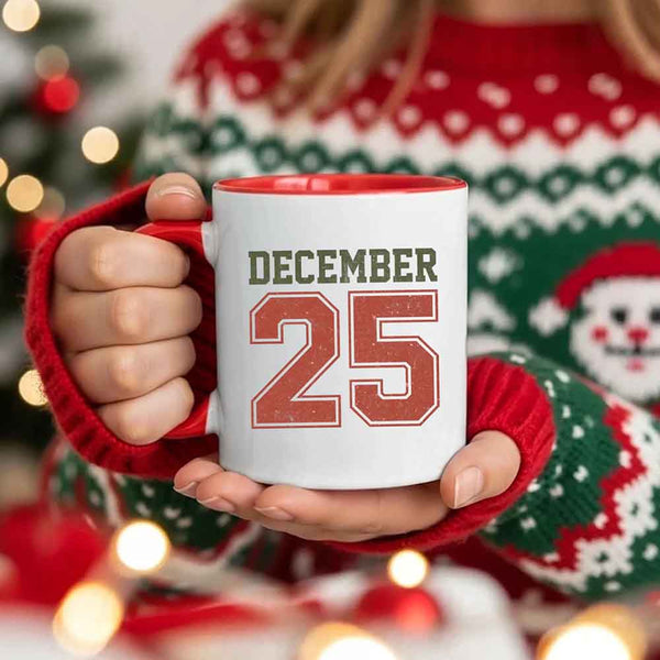 May include a glossy ceramic mug with a retro December 25 Christmas design in traditional holiday colors.