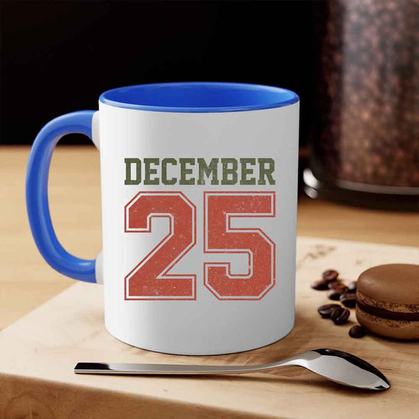 May include a glossy ceramic mug with a retro December 25 Christmas design in traditional holiday colors.