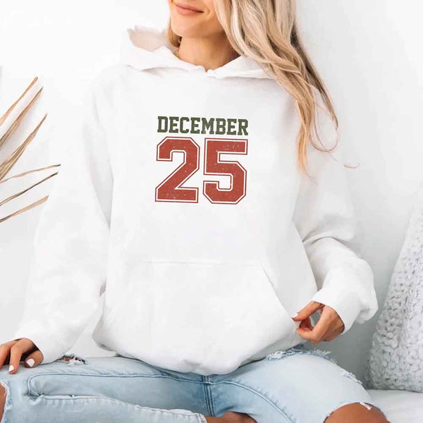 May include a retro-style Christmas hoodie with the text December 25 printed in a clean, vintage-inspired design.
