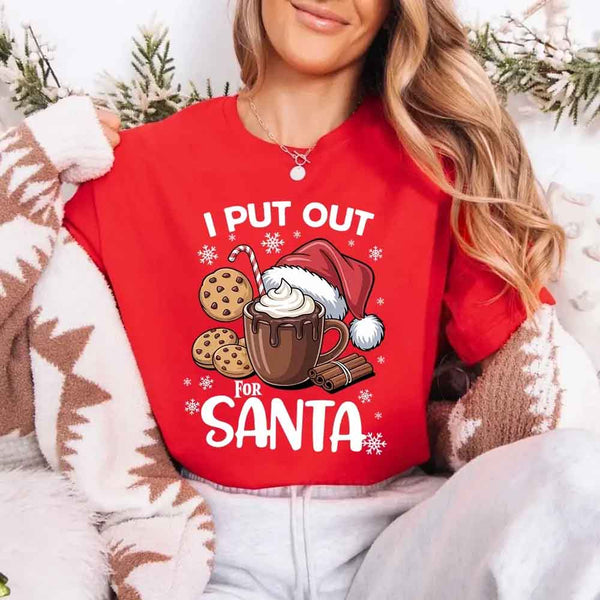 May include a pair of matching Christmas couple shirts with a playful Santa phrase printed on the front, shown on a flat surface.