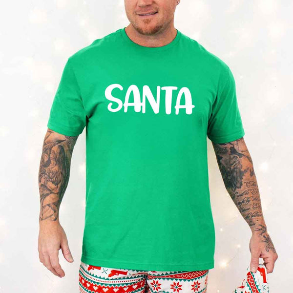 May include a pair of matching Christmas couple shirts with a playful Santa phrase printed on the front, shown on a flat surface.