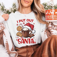 May include a pair of matching Christmas couple shirts with a playful Santa phrase printed on the front, shown on a flat surface.