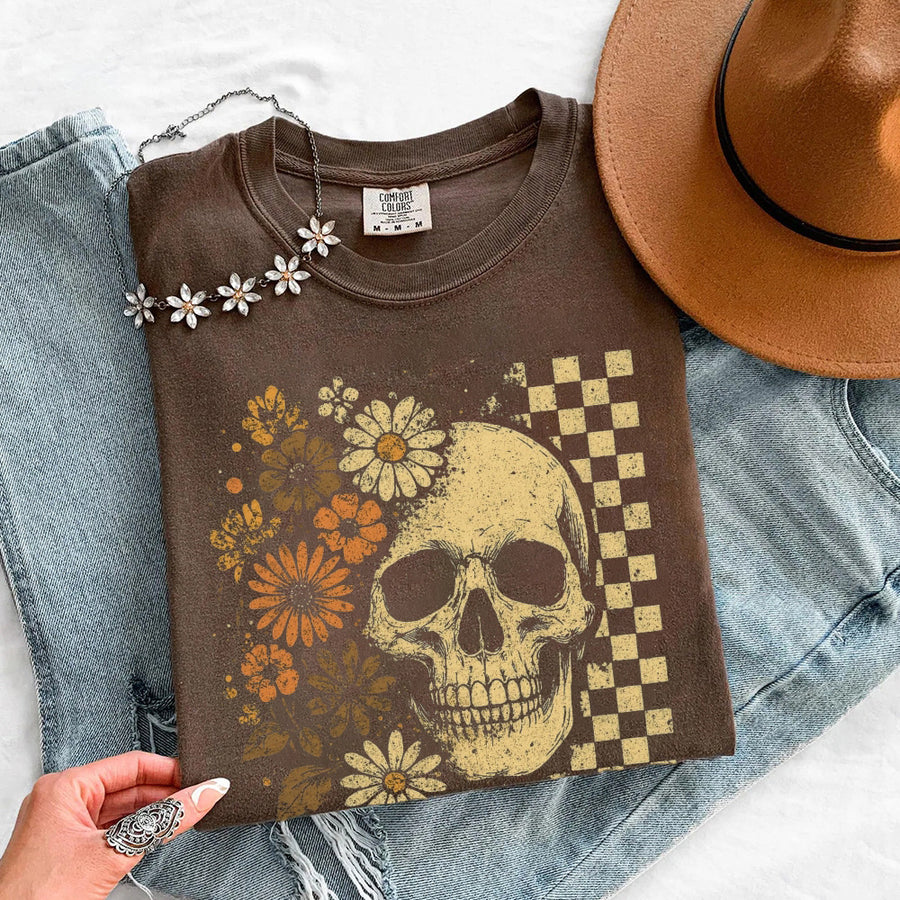 May include Skull & Flowers Firefly Comfort Colors Halloween t-shirt with skull, floral, and glowing firefly graphic on a relaxed unisex tee