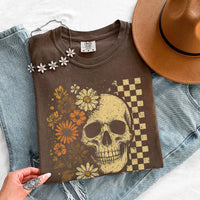 May include Skull & Flowers Firefly Comfort Colors Halloween t-shirt with skull, floral, and glowing firefly graphic on a relaxed unisex tee