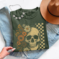 May include Skull & Flowers Firefly Comfort Colors Halloween t-shirt with skull, floral, and glowing firefly graphic on a relaxed unisex tee