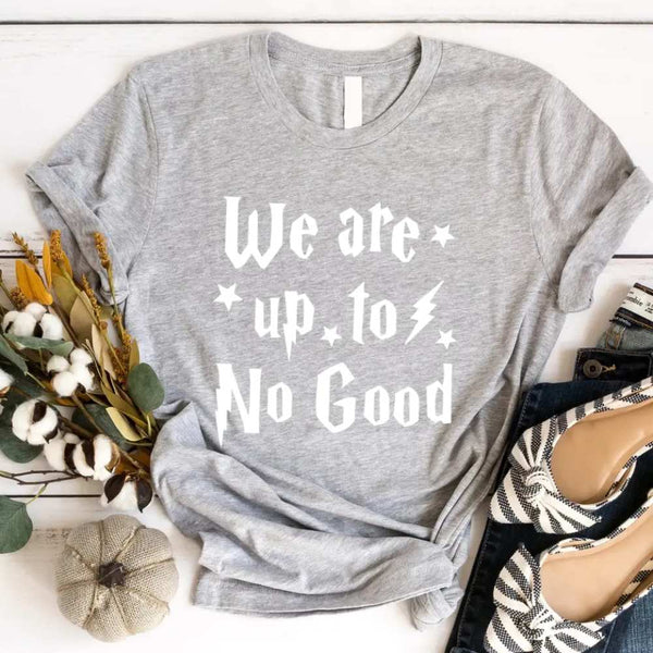 May include a matching couples or best friends t-shirt design featuring the phrase “I Solemnly Swear We Are Up to No Good” in bold, playful lettering, reflecting a fun, mischievous theme meant to be worn together.