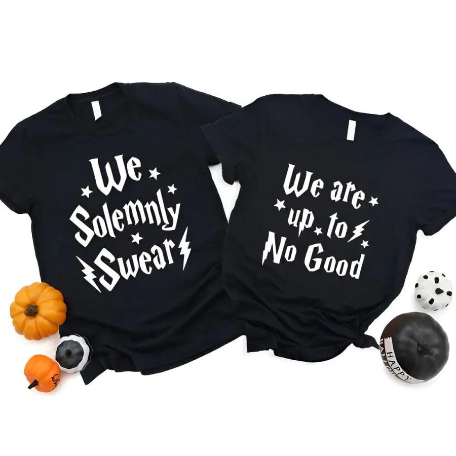 May include a matching couples or best friends t-shirt design featuring the phrase “I Solemnly Swear We Are Up to No Good” in bold, playful lettering, reflecting a fun, mischievous theme meant to be worn together.
