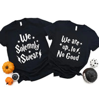 May include a matching couples or best friends t-shirt design featuring the phrase “I Solemnly Swear We Are Up to No Good” in bold, playful lettering, reflecting a fun, mischievous theme meant to be worn together.
