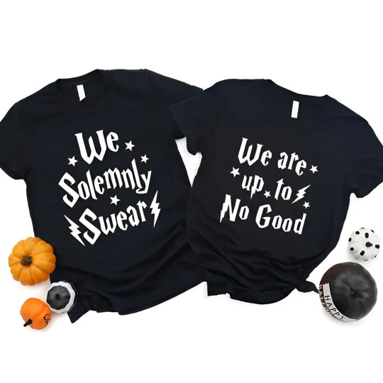 May include a matching couples or best friends t-shirt design featuring the phrase “I Solemnly Swear We Are Up to No Good” in bold, playful lettering, reflecting a fun, mischievous theme meant to be worn together.