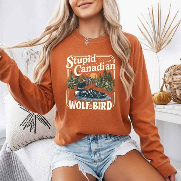 May include Stupid Canadian Wolf Bird Comfort Colors long sleeve shirt with hockey romance BookTok graphic and relaxed fit