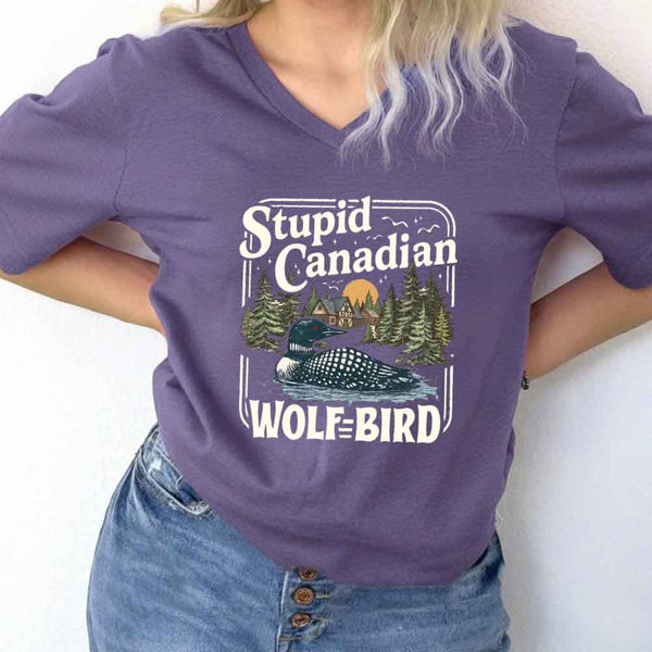 May include Stupid Canadian Wolf Bird v-neck tee with hockey romance BookTok graphic and relaxed unisex fit