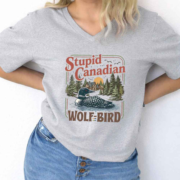 May include Stupid Canadian Wolf Bird v-neck tee with hockey romance BookTok graphic and relaxed unisex fit