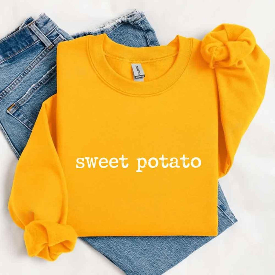May include a pair of matching Thanksgiving-themed sweatshirts featuring the playful “Sweet Potato” and “Rude Potato” designs. The cozy crew necks are styled in warm fall colors, making them a fun and festive choice for couples during the autumn and holiday season.