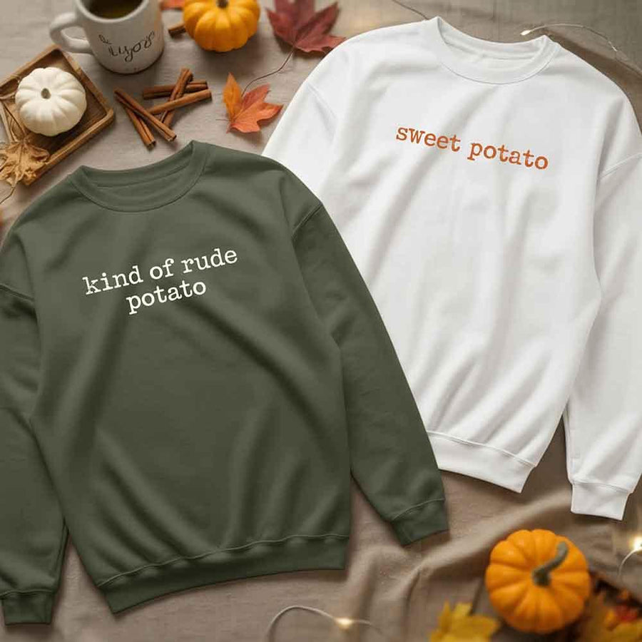 May include a pair of matching Thanksgiving-themed sweatshirts featuring the playful “Sweet Potato” and “Rude Potato” designs. The cozy crew necks are styled in warm fall colors, making them a fun and festive choice for couples during the autumn and holiday season.