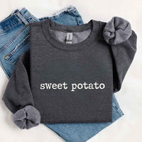 May include a pair of matching Thanksgiving-themed sweatshirts featuring the playful “Sweet Potato” and “Rude Potato” designs. The cozy crew necks are styled in warm fall colors, making them a fun and festive choice for couples during the autumn and holiday season.