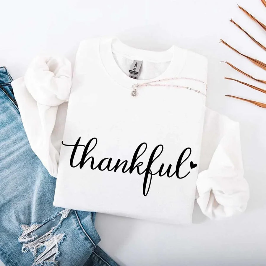 White sweatshirt with 'thankful' design for thanksgiving
