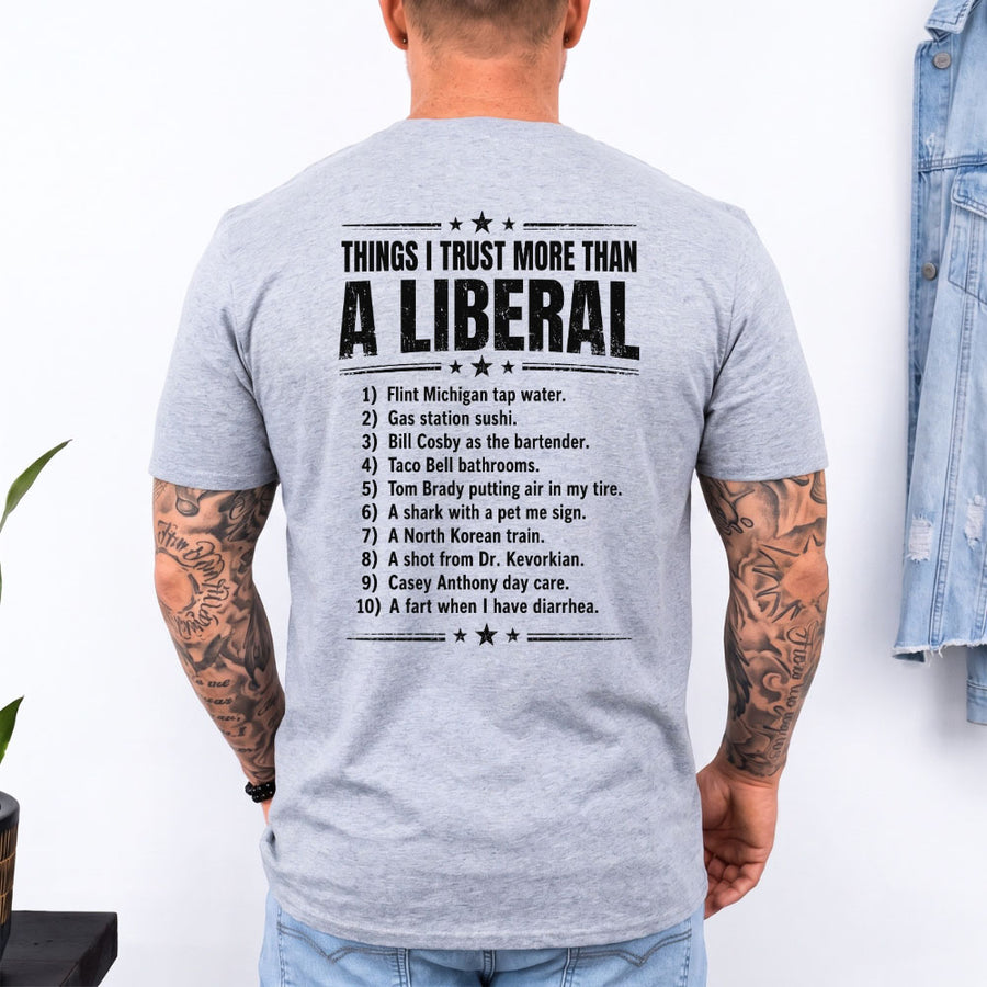 May include a Things I Trust More Than a Liberal Funny Political T-Shirt featuring a sarcastic political statement, designed for fans of political satire, bold slogans, and humorous graphic apparel.