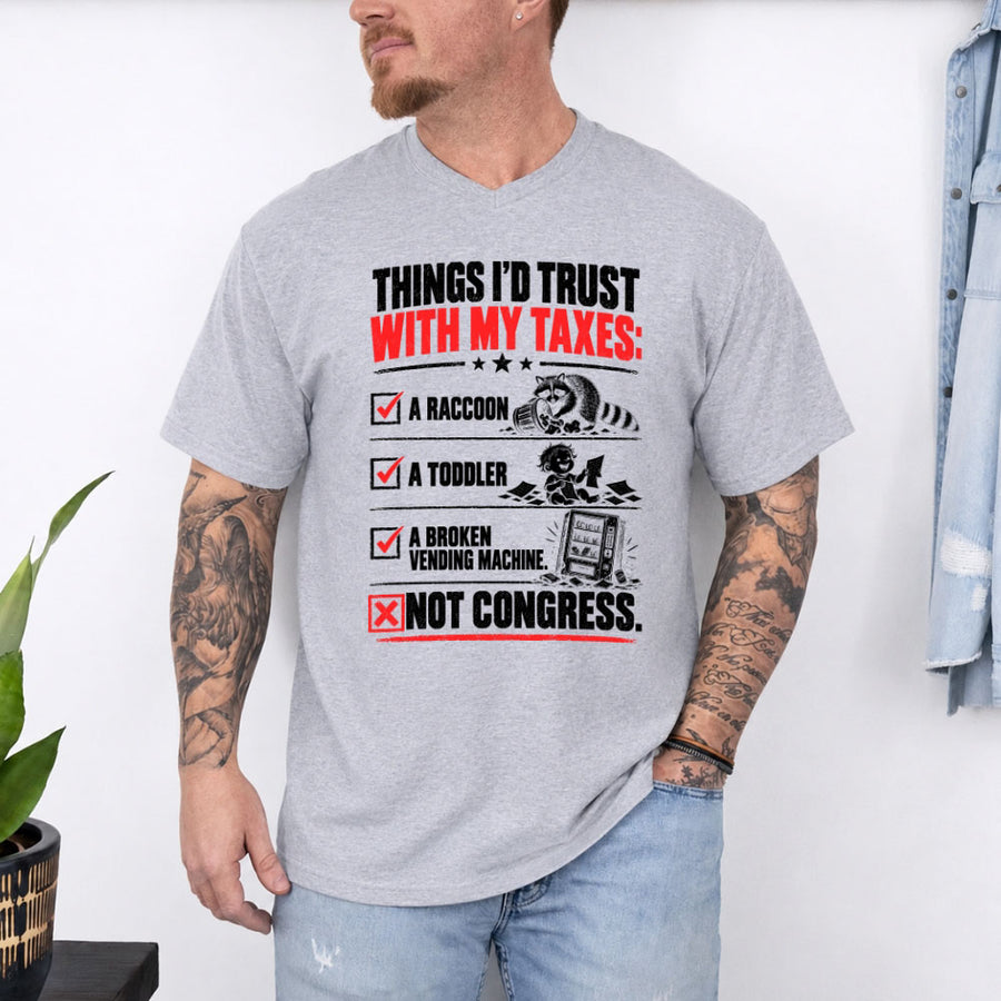 May include a Things I'd Trust with My Taxes Funny Political T-Shirt featuring a humorous tax-related statement, ideal for taxpayers, political satire fans, and people who enjoy sarcastic graphic apparel.