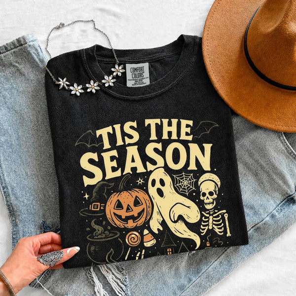 May include 'Tis The Season Comfort Colors t-shirt with Halloween graphic, relaxed unisex fit, and garment-dyed cotton