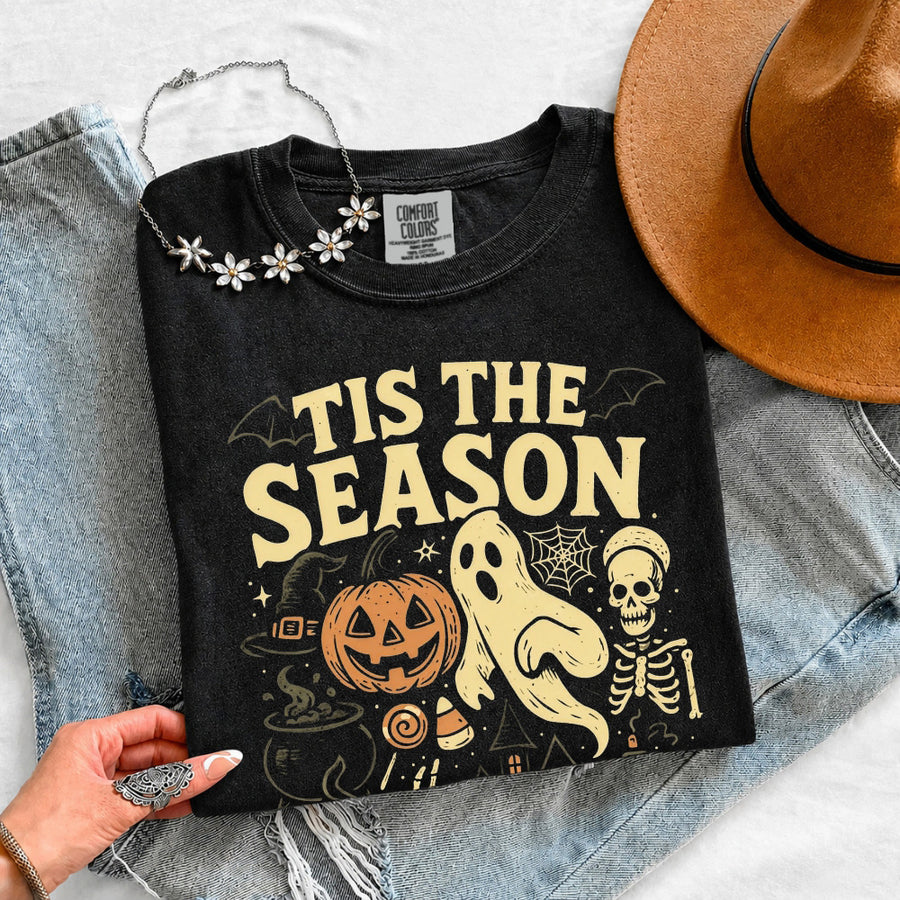 May include 'Tis The Season Comfort Colors t-shirt with Halloween graphic, relaxed unisex fit, and garment-dyed cotton