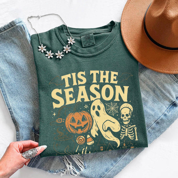 May include 'Tis The Season Comfort Colors t-shirt with Halloween graphic, relaxed unisex fit, and garment-dyed cotton