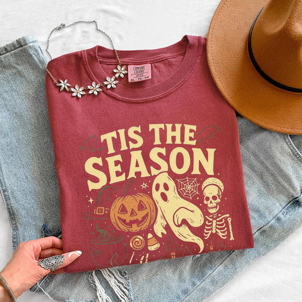 May include 'Tis The Season Comfort Colors t-shirt with Halloween graphic, relaxed unisex fit, and garment-dyed cotton
