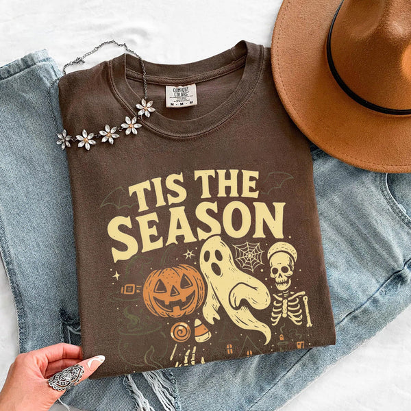 May include 'Tis The Season Comfort Colors t-shirt with Halloween graphic, relaxed unisex fit, and garment-dyed cotton
