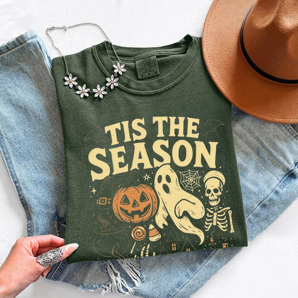 May include 'Tis The Season Comfort Colors t-shirt with Halloween graphic, relaxed unisex fit, and garment-dyed cotton