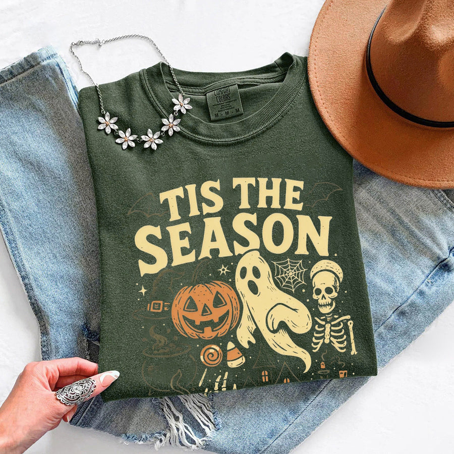 May include 'Tis The Season Comfort Colors t-shirt with Halloween graphic, relaxed unisex fit, and garment-dyed cotton