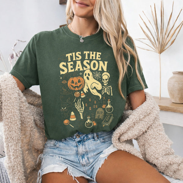 May include 'Tis The Season Comfort Colors t-shirt with Halloween graphic, relaxed unisex fit, and garment-dyed cotton
