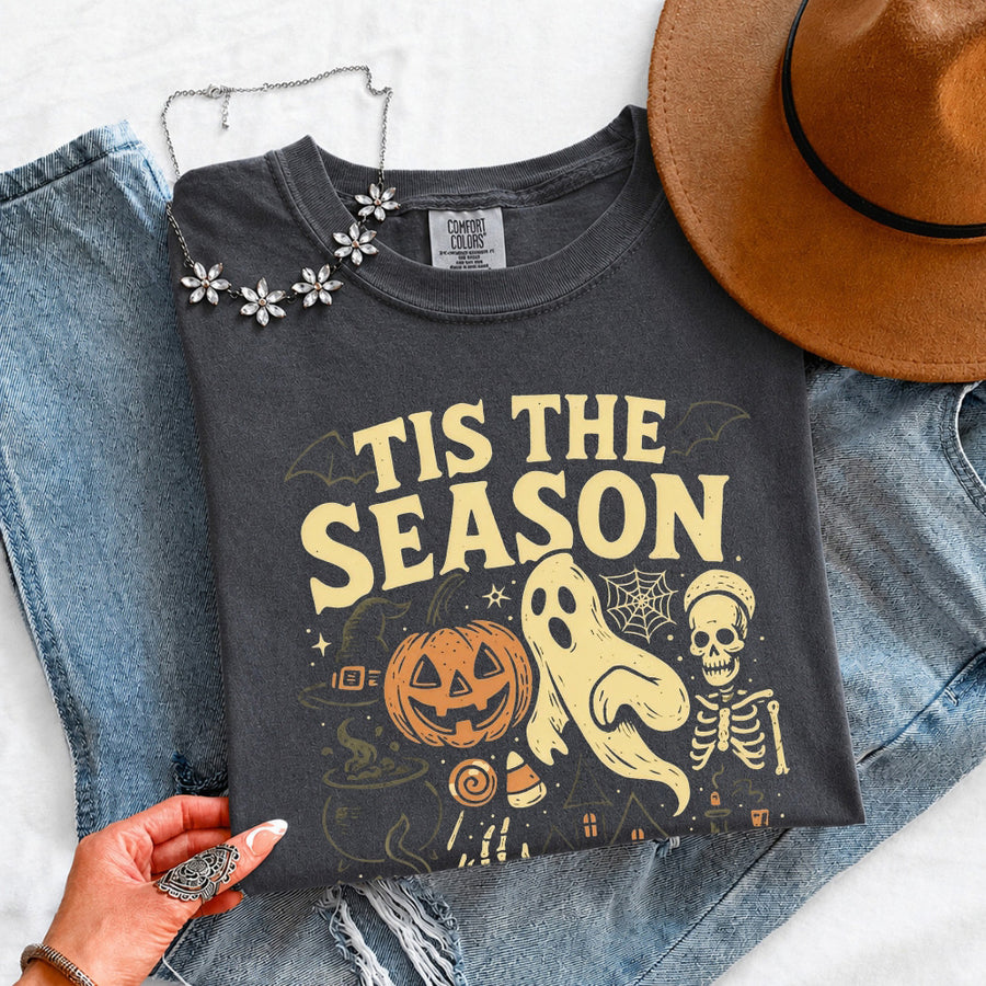 May include 'Tis The Season Comfort Colors t-shirt with Halloween graphic, relaxed unisex fit, and garment-dyed cotton