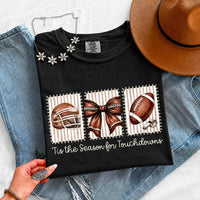 May include a Comfort Colors T-shirt featuring a 'Tis the Season for Touchdowns football-inspired design, perfect for football fans, game days, tailgates, and holiday gatherings.