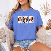 May include a Comfort Colors T-shirt featuring a 'Tis the Season for Touchdowns football-inspired design, perfect for football fans, game days, tailgates, and holiday gatherings.