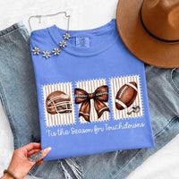 May include a Comfort Colors T-shirt featuring a 'Tis the Season for Touchdowns football-inspired design, perfect for football fans, game days, tailgates, and holiday gatherings.