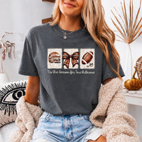 May include a Comfort Colors T-shirt featuring a 'Tis the Season for Touchdowns football-inspired design, perfect for football fans, game days, tailgates, and holiday gatherings.