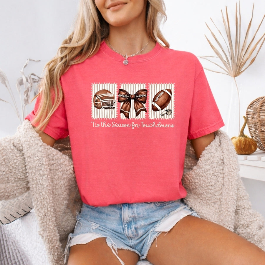 May include a Comfort Colors T-shirt featuring a 'Tis the Season for Touchdowns football-inspired design, perfect for football fans, game days, tailgates, and holiday gatherings.