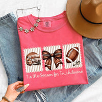 May include a Comfort Colors T-shirt featuring a 'Tis the Season for Touchdowns football-inspired design, perfect for football fans, game days, tailgates, and holiday gatherings.