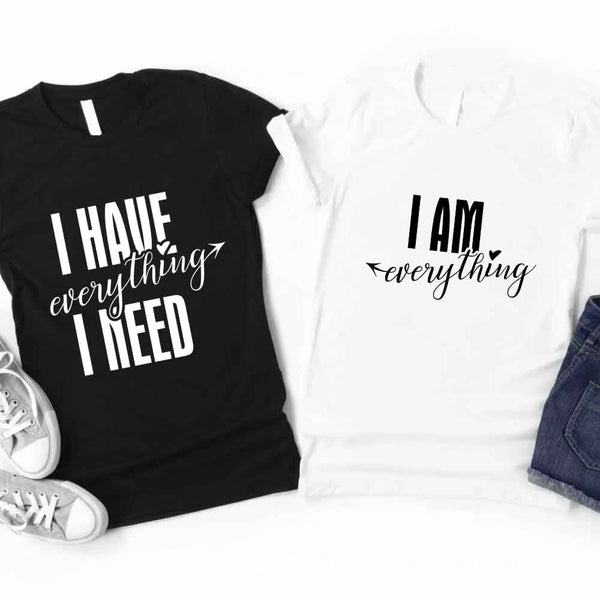 May include a couples t-shirt design featuring the phrase “I Have Everything I Need” and "I am everything" in clear, balanced lettering, often paired with a small heart or matching graphic that reflects love, gratitude, and partnership.