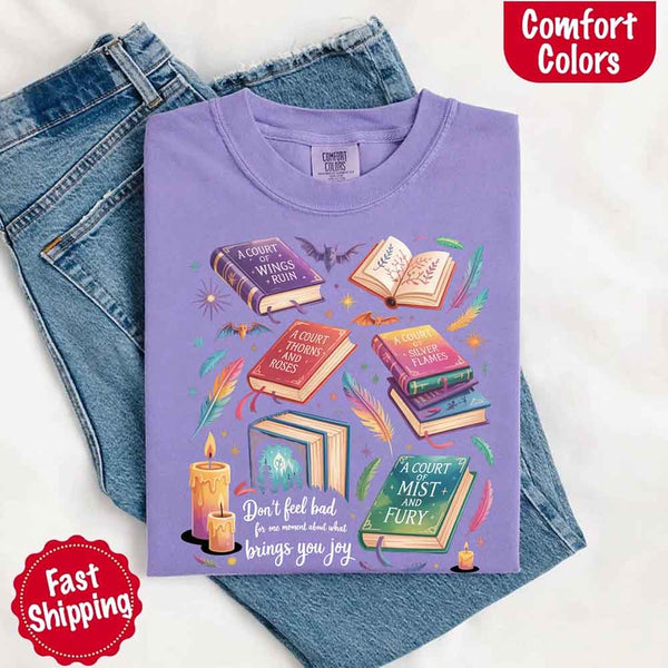 May include colorful illustrated books from the “A Court of Thorns and Roses” series surrounded by feathers, candles, and stars, with the quote “Don’t feel bad for one moment about what brings you joy,” celebrating fantasy fiction and book lover pride.