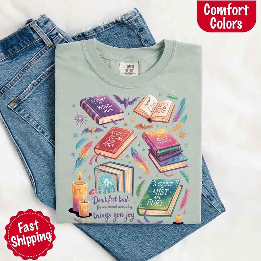 May include colorful illustrated books from the “A Court of Thorns and Roses” series surrounded by feathers, candles, and stars, with the quote “Don’t feel bad for one moment about what brings you joy,” celebrating fantasy fiction and book lover pride.