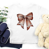 May include a white color kids' t-shirt with a football bow design