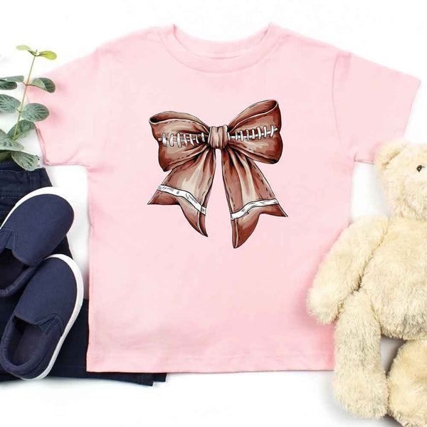 May include a pink color kids' t-shirt with a football bow design