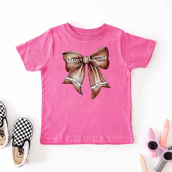 May include a raspberry color kids' t-shirt with a football bow design