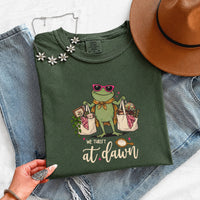 May include a We Thrift at Dawn Comfort Colors T-Shirt featuring a playful thrift-inspired statement design.