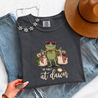 May include a We Thrift at Dawn Comfort Colors T-Shirt featuring a playful thrift-inspired statement design.