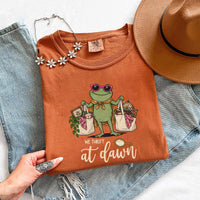 May include a We Thrift at Dawn Comfort Colors T-Shirt featuring a playful thrift-inspired statement design.