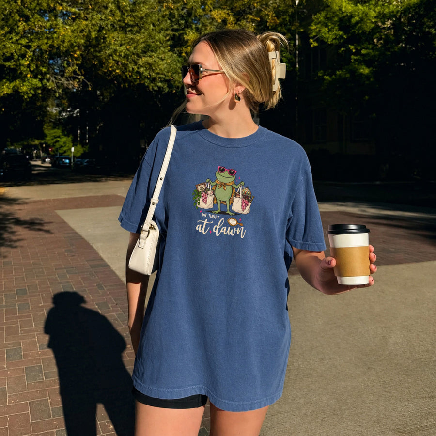 May include a We Thrift at Dawn Comfort Colors T-Shirt featuring a playful thrift-inspired statement design.