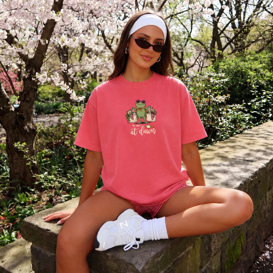 May include a We Thrift at Dawn Comfort Colors T-Shirt featuring a playful thrift-inspired statement design.
