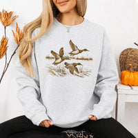 May include Wild Mallard Ducks sweatshirt with mallard duck graphic, classic unisex crewneck, long sleeves, and soft fleece fabric