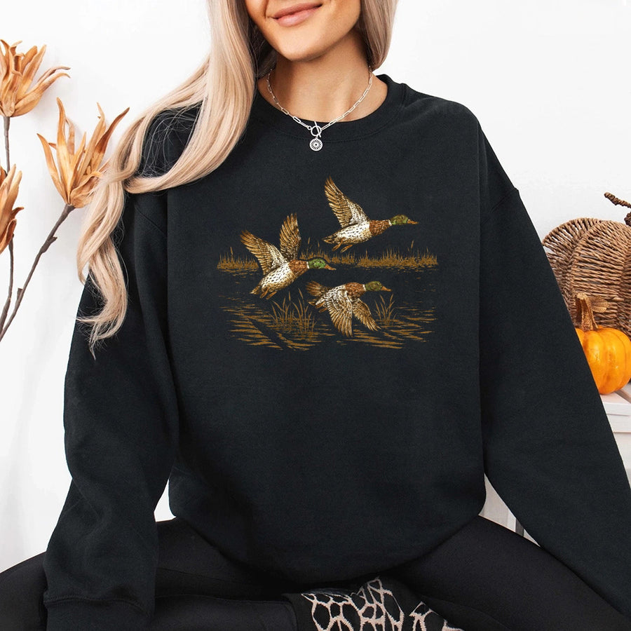 May include Wild Mallard Ducks sweatshirt with mallard duck graphic, classic unisex crewneck, long sleeves, and soft fleece fabric